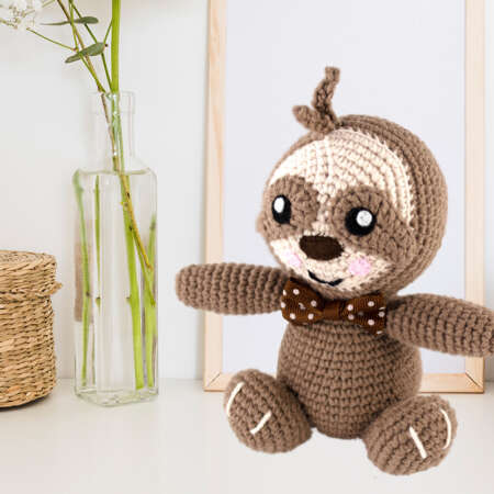 crochet sloth toy front view